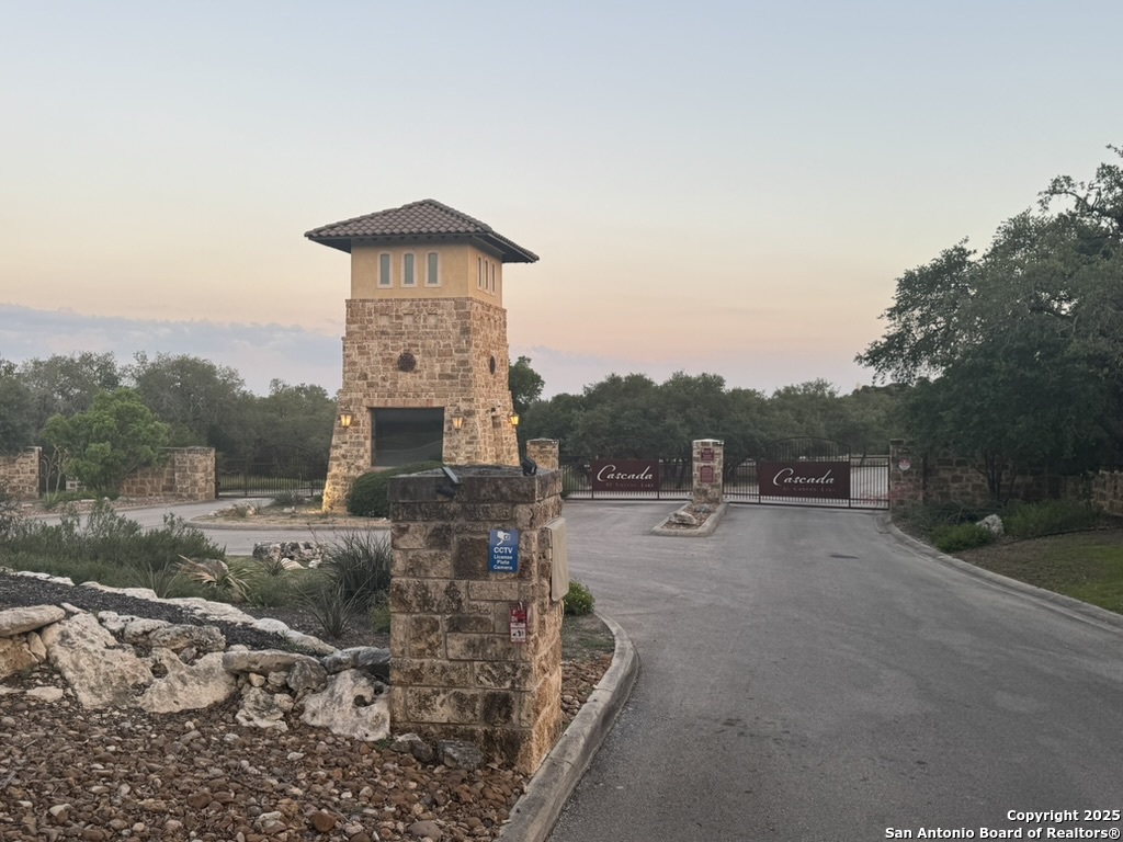 2319 Cascada Parkway Spring Branch, TX 78070 - Photo 8 of 32 a terrace with a bench and trees