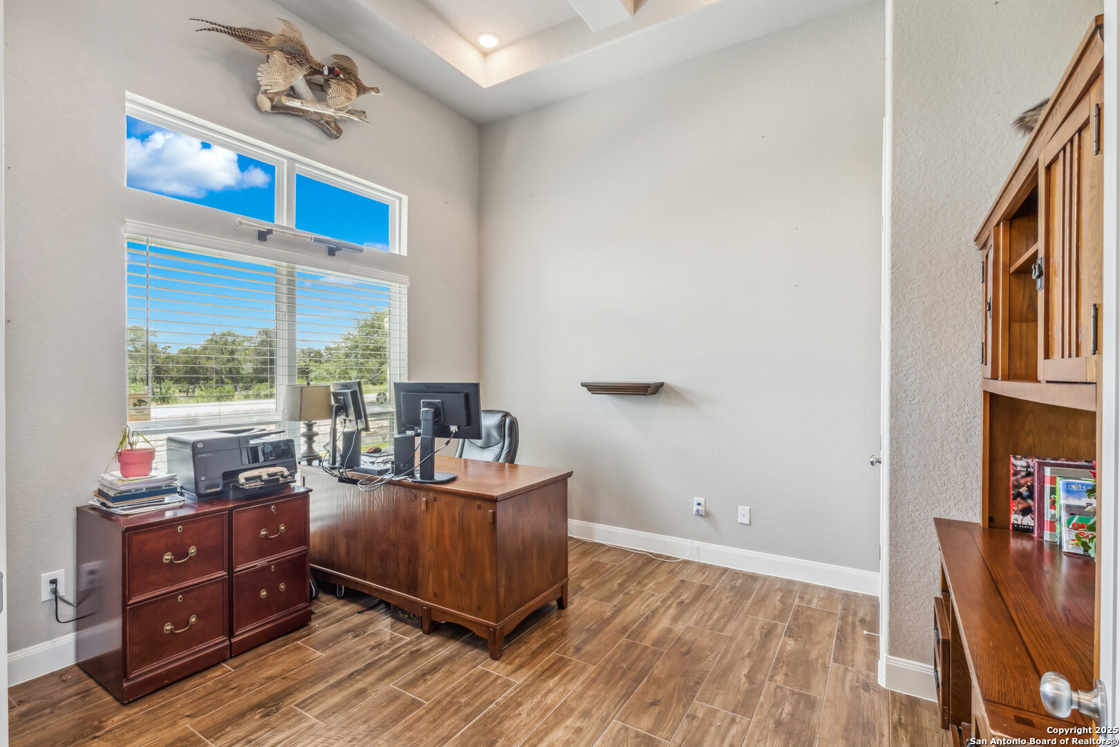 2319 Cascada Parkway Spring Branch, TX 78070 - Photo 10 of 32 a living room with furniture and a floor to ceiling window