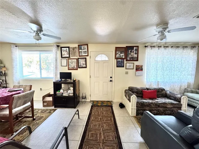 a bedroom with furniture or couch and a window