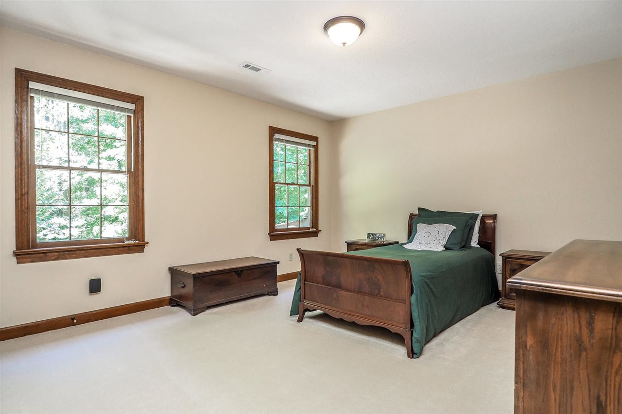 5009 Field And Stream Road Raleigh, NC 27613 - Photo 10 of 12 Secondary bedroom has plenty of NATURAL light. Bedroom