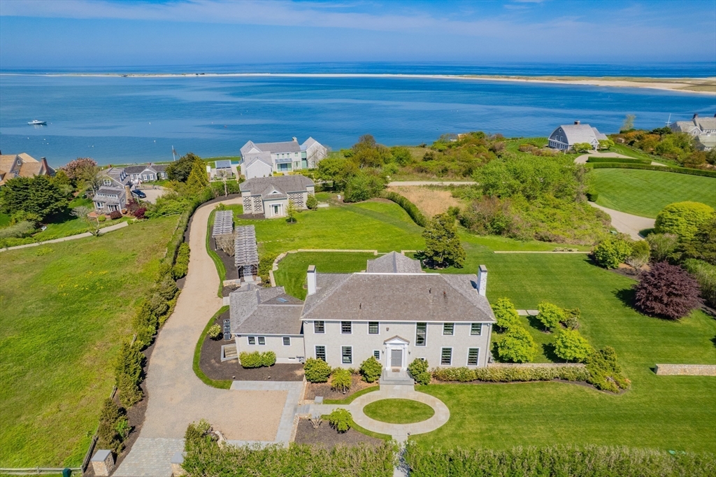 a view of a swimming pool with a yard