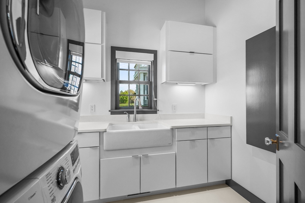 108 Shore Road Chatham, MA 02633 - Photo 22 of 32 a bathroom with a sink and a mirror