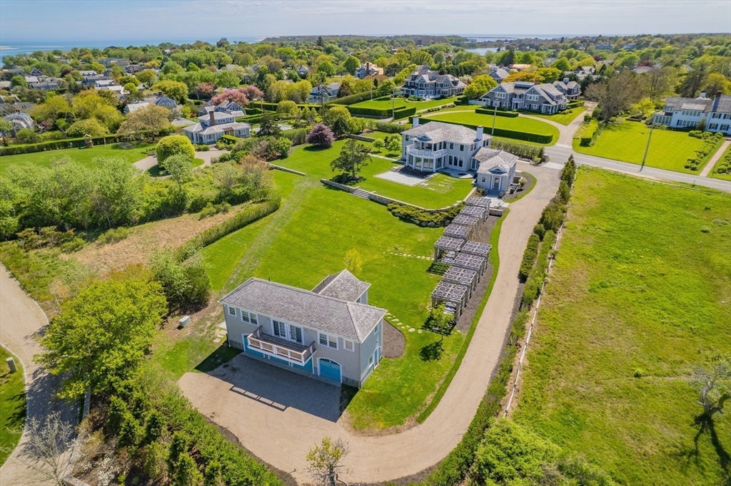 108 Shore Road Chatham, MA 02633 - Photo 7 of 32 view of a swimming pool with a yard