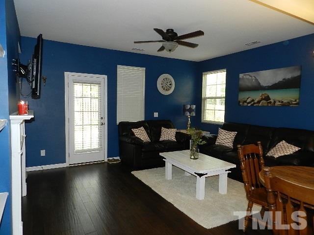 688 Wickham Ridge Road Apex, NC 27539 - Photo 9 of 20 a living room with furniture and a window