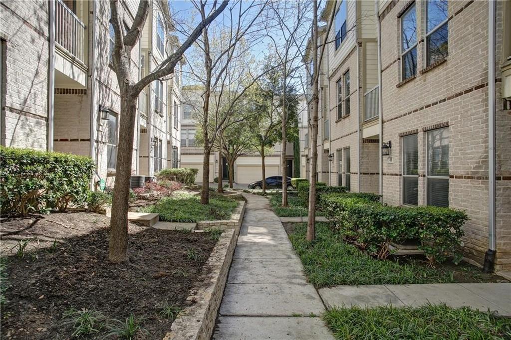 4830 Cedar Springs Road, Unit 43 Dallas, TX 75219 - Photo 21 of 22 View of property's community featuring a garage