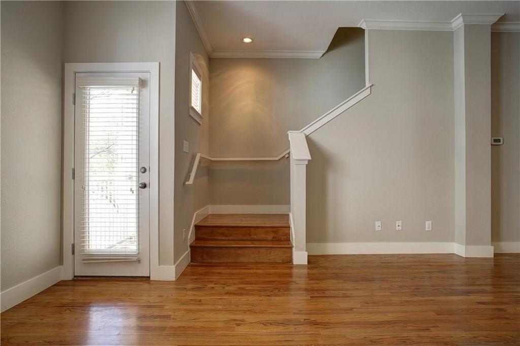 4830 Cedar Springs Road, Unit 43 Dallas, TX 75219 - Photo 6 of 22 Staircase with ornamental molding and light hardwood / wood-style floors