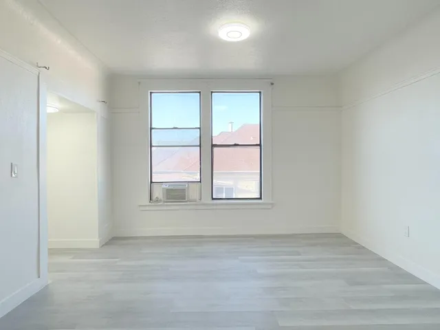 an empty room with a window