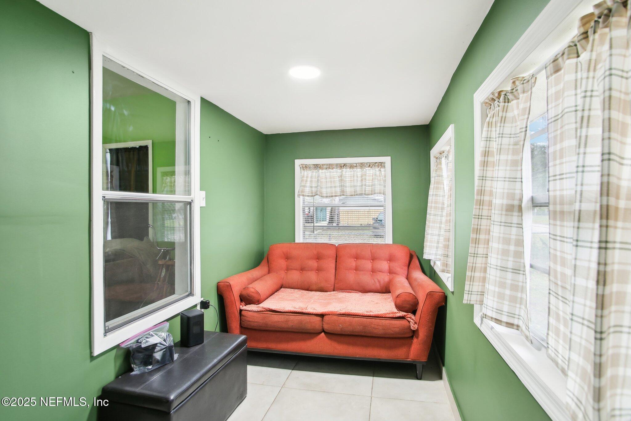216 West Fox Street Hastings, FL 32145 - Photo 7 of 20 a living room with furniture and a window
