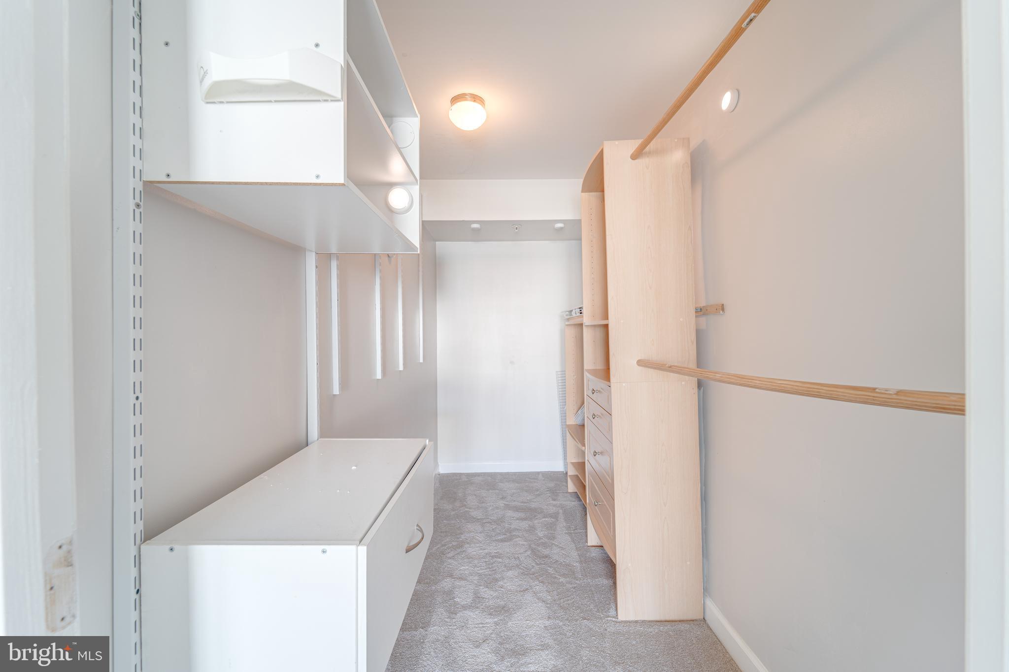 9220 Cardinal Forest Lane, Unit E Lorton, VA 22079 - Photo 21 of 26 a view of a hallway to rooms