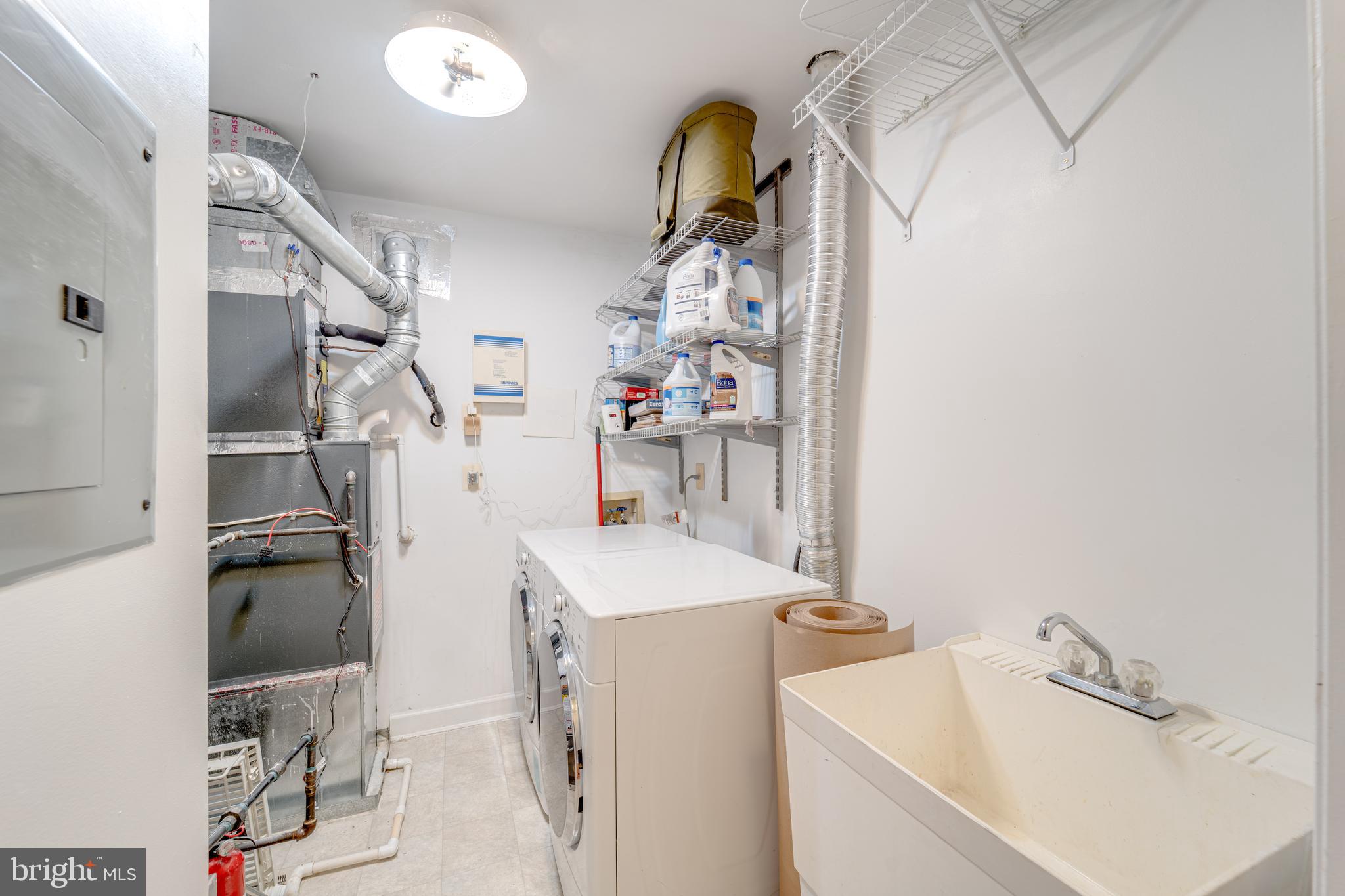 9220 Cardinal Forest Lane, Unit E Lorton, VA 22079 - Photo 22 of 26 a room with storage and utility