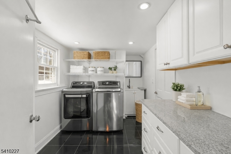 444 White Oak Ridge Road Short Hills, NJ 07078 - Photo 15 of 17 a kitchen with stainless steel appliances granite countertop a sink stove and refrigerator
