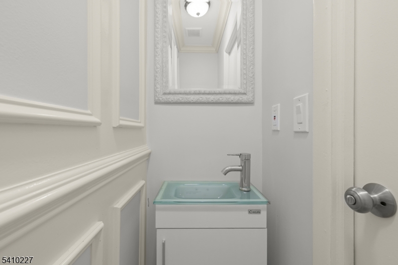 444 White Oak Ridge Road Short Hills, NJ 07078 - Photo 16 of 17 a bathroom with a sink and vanity