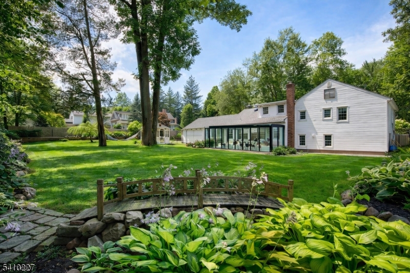 444 White Oak Ridge Road Short Hills, NJ 07078 - Photo 17 of 17 a view of a house with garden