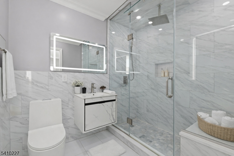 444 White Oak Ridge Road Short Hills, NJ 07078 - Photo 8 of 17 a bathroom with a toilet sink and shower