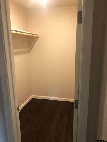 a view of small space with wooden floor