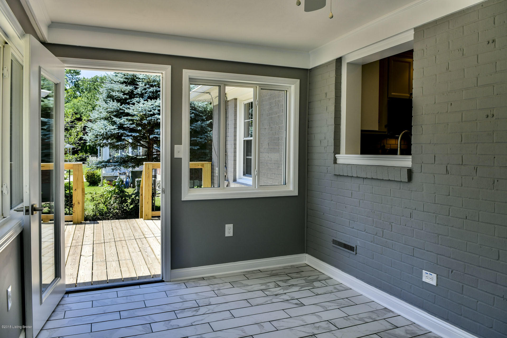 3708 Hanover Road Louisville, KY 40207 - Photo 13 of 36 Sunroom leads to the back deck