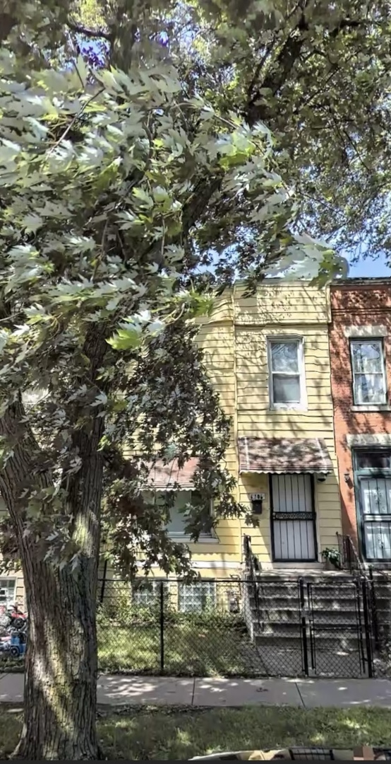 6706 South Parnell Avenue Chicago, IL 60621 - Photo 21 of 21 a view of house with yard