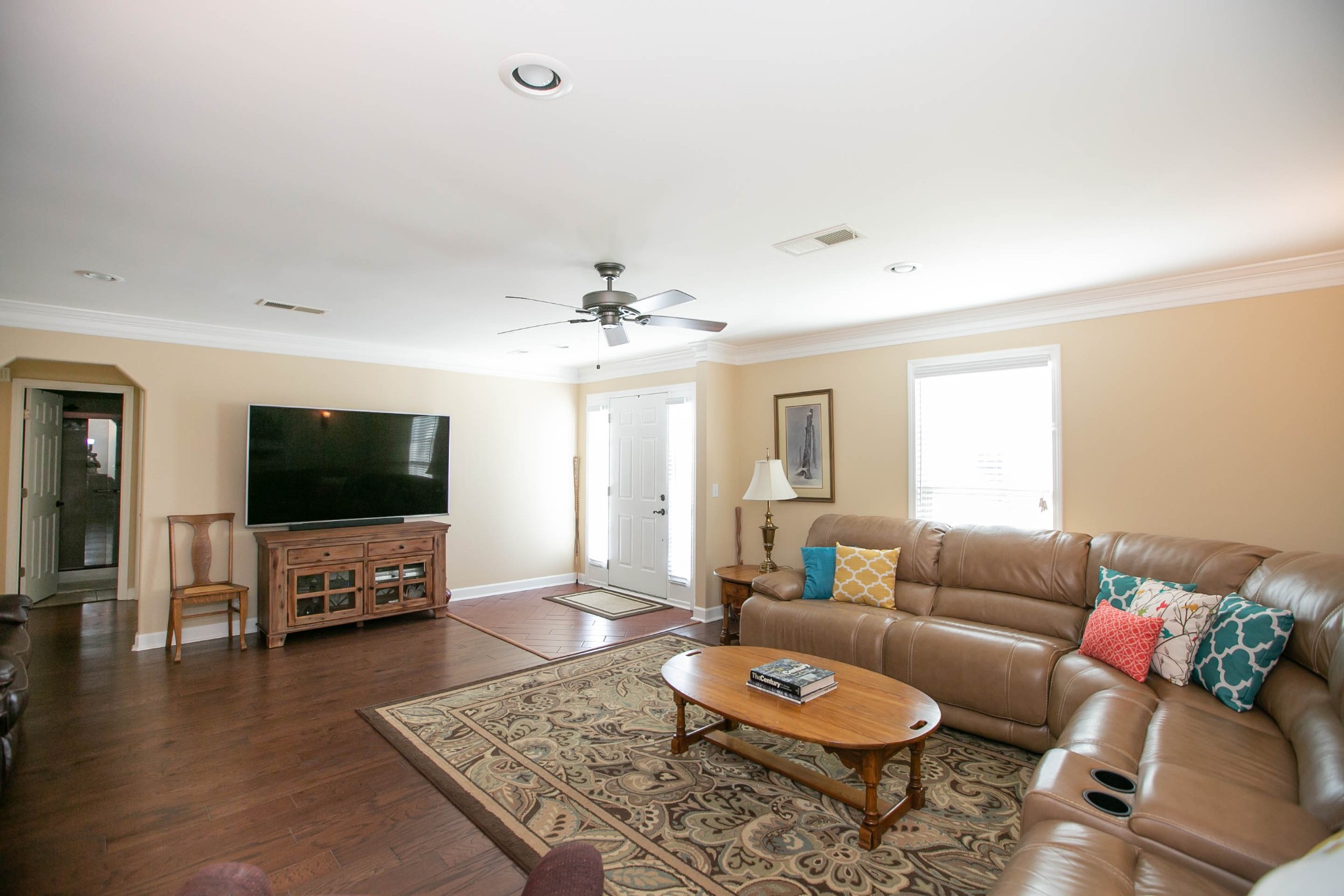 1321 General George Patton Road Nashville, TN 37221 - Photo 3 of 29 a living room with furniture and a flat screen tv
