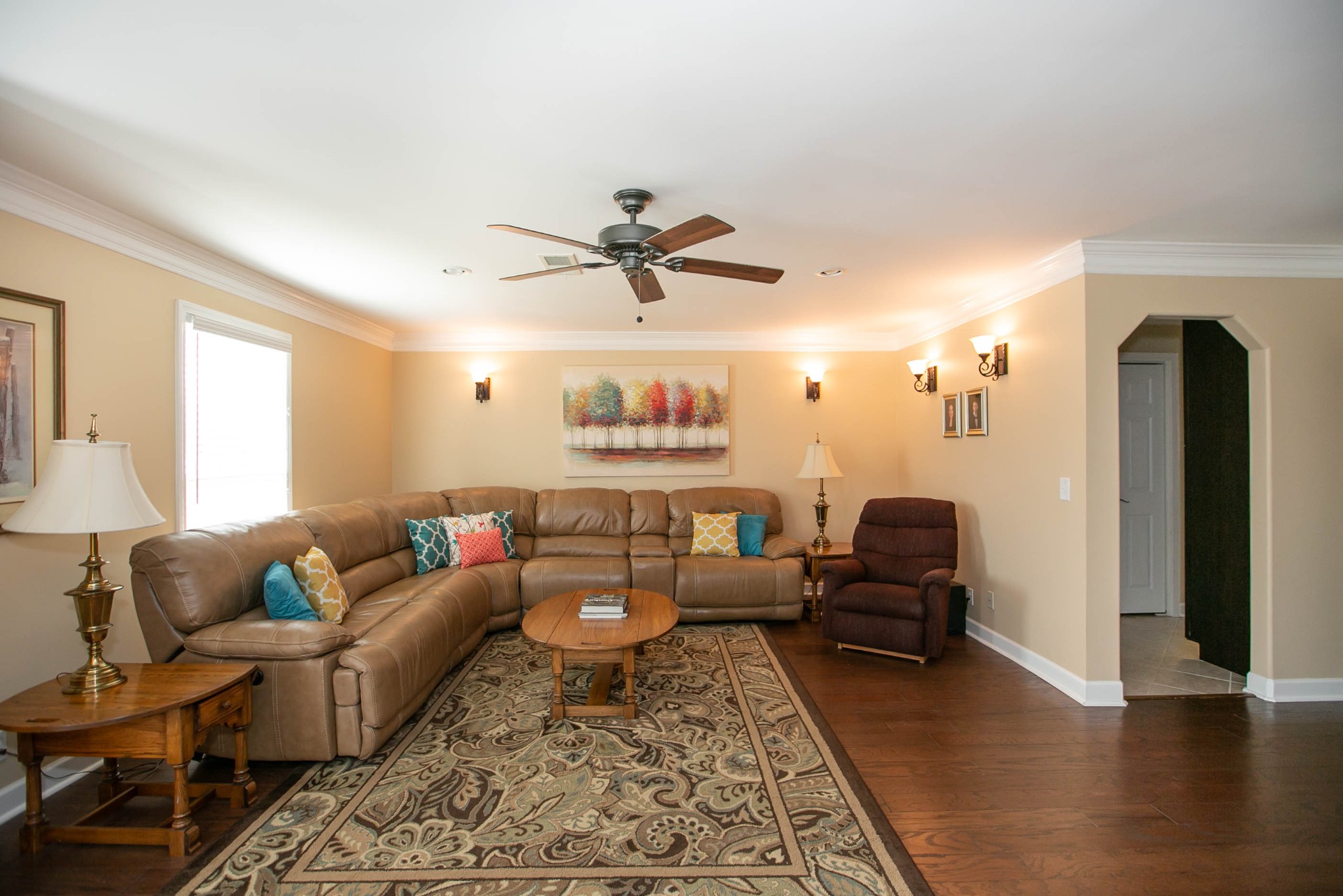 1321 General George Patton Road Nashville, TN 37221 - Photo 4 of 29 a living room with furniture ceiling fan and a rug