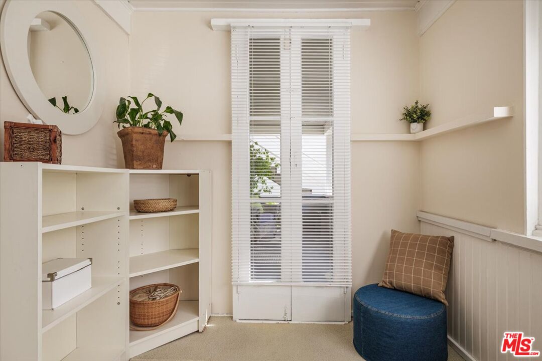 2315 Cove Avenue Los Angeles, CA 90039 - Photo 13 of 49 a living room with furniture and wooden floor