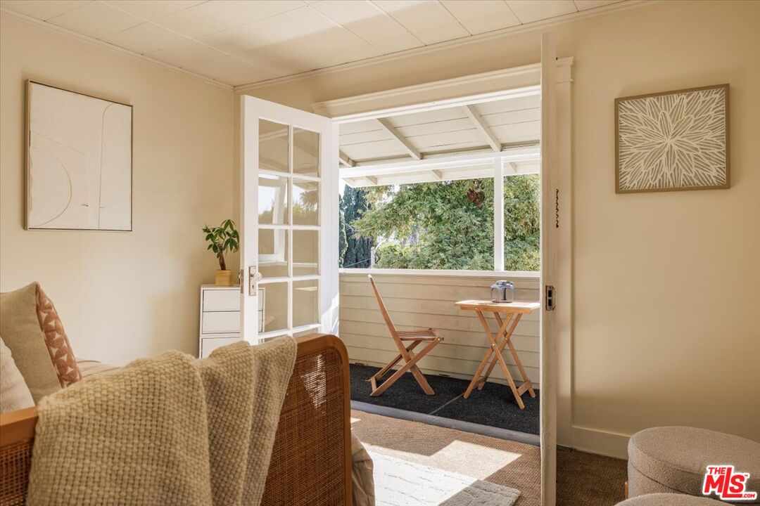 2315 Cove Avenue Los Angeles, CA 90039 - Photo 42 of 49 a living room with furniture and a window