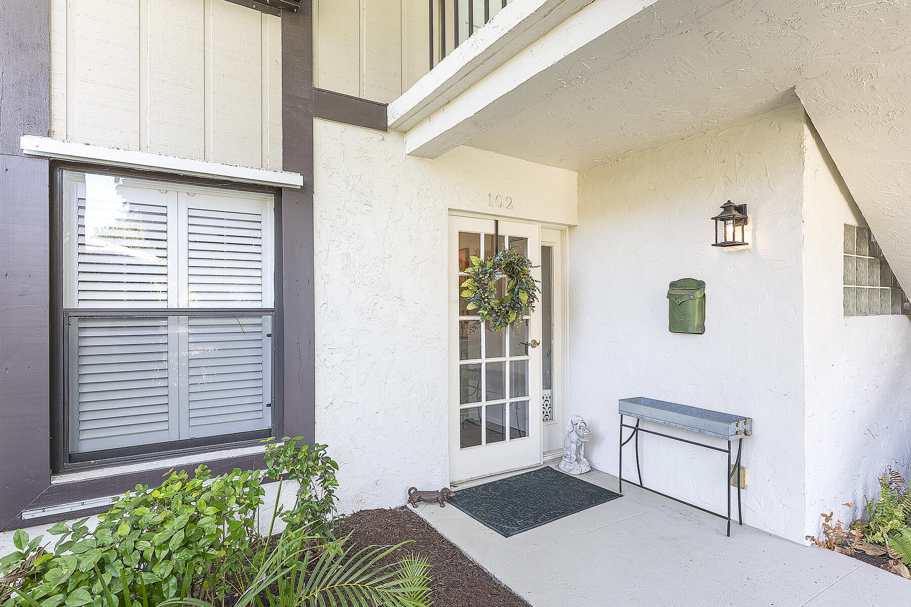 13321 Polo Club Road, Unit C102 Wellington, FL 33414 - Photo 2 of 32 02_Entrance_Exterior