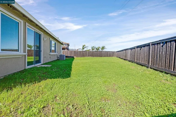 a view of a backyard with garden