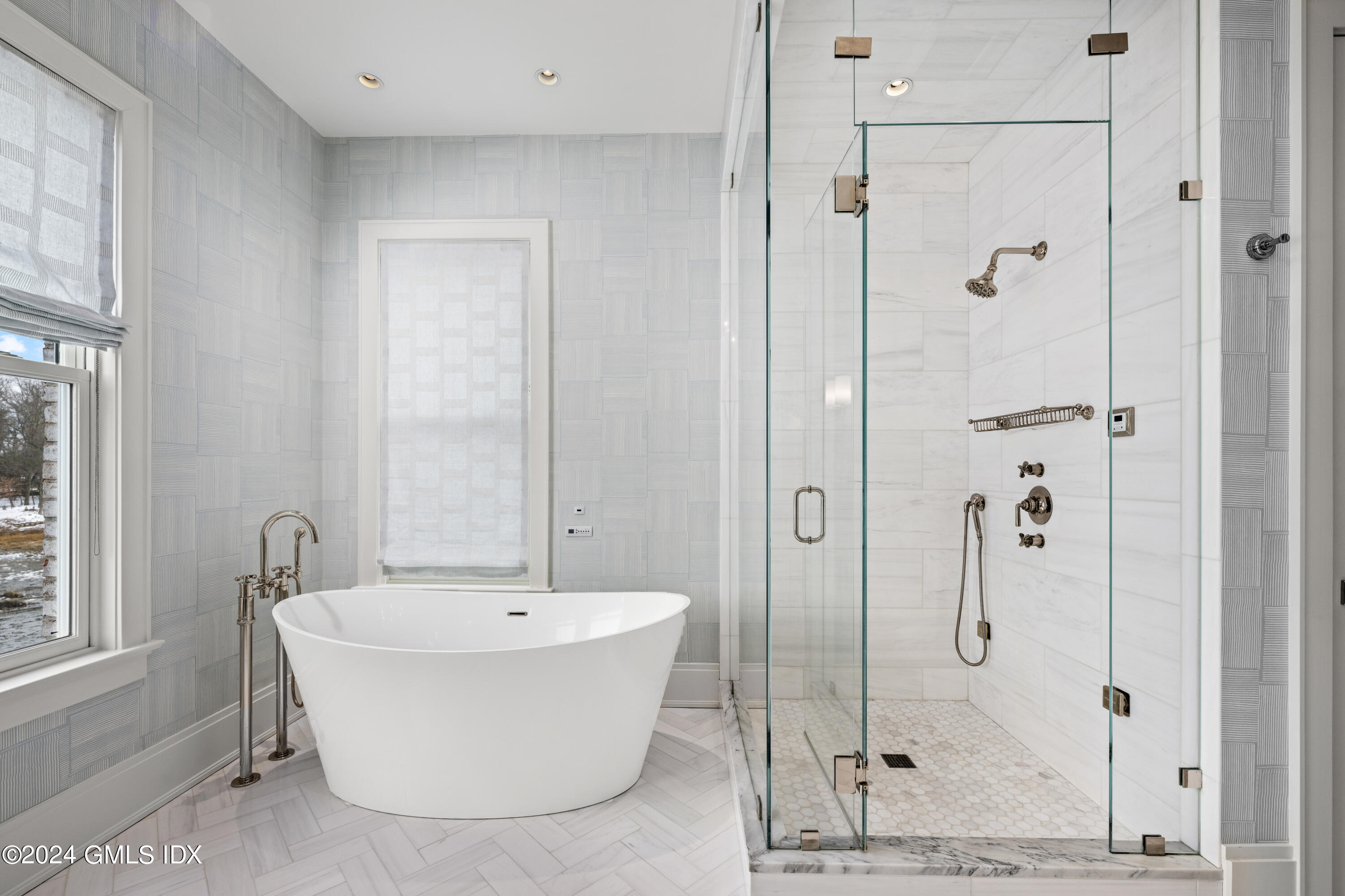 2 Oneida Drive, Unit F Greenwich, CT 06830 - Photo 16 of 31 a bathroom with a bathtub and shower