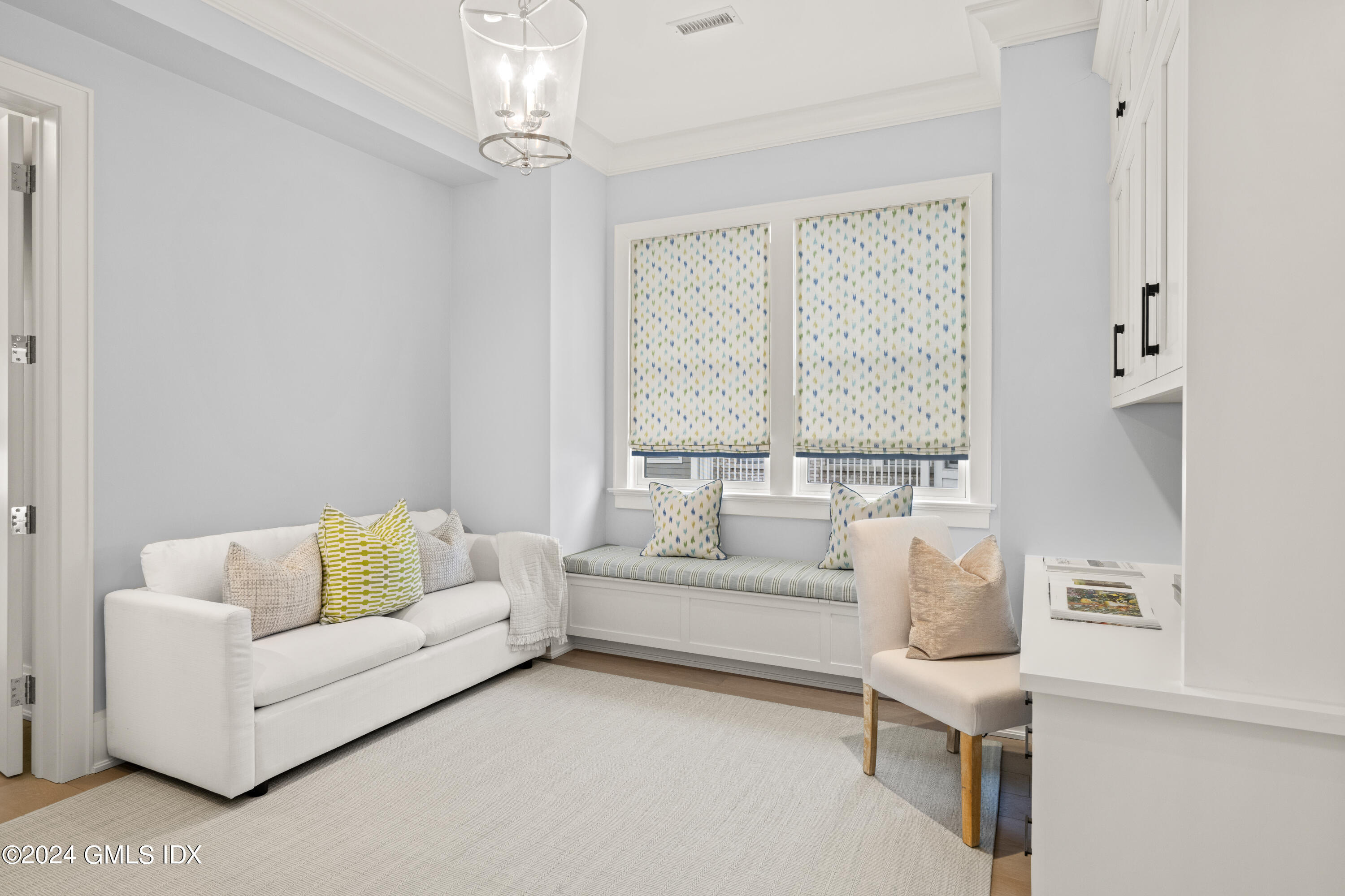 2 Oneida Drive, Unit F Greenwich, CT 06830 - Photo 22 of 31 a living room with furniture and a large window