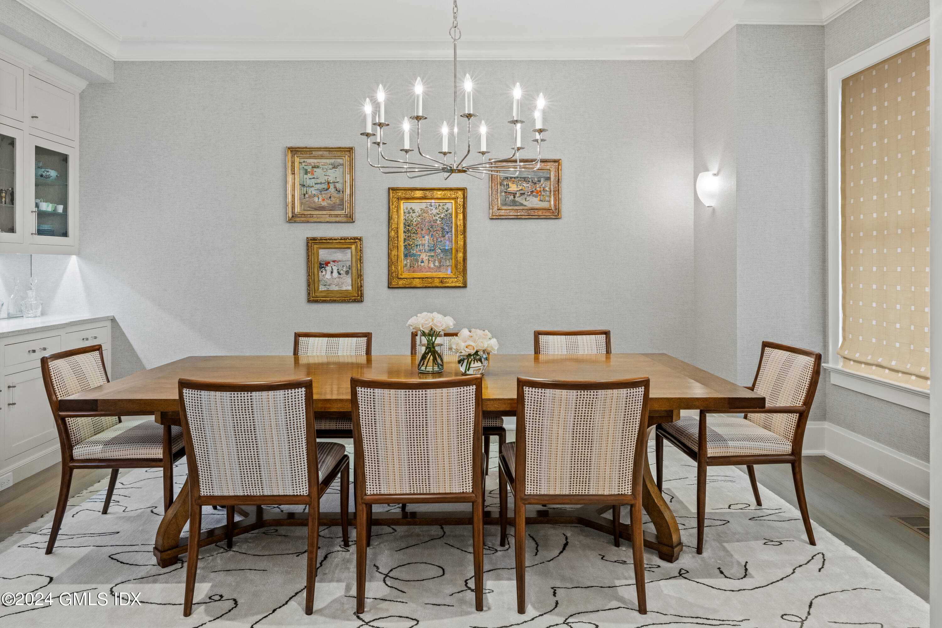 2 Oneida Drive, Unit F Greenwich, CT 06830 - Photo 9 of 31 a view of a dining room with furniture and chandelier