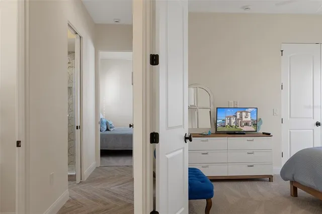a living room with furniture and windows