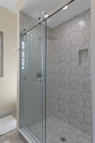 a bedroom with a bed and furniture