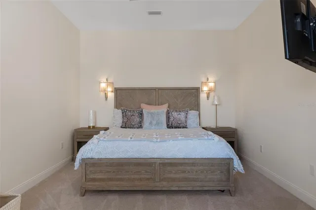 a bathroom with a double vanity sink mirror and bathtub