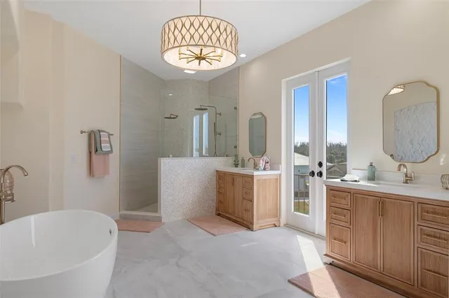 a view of a living room and kitchen with a large window