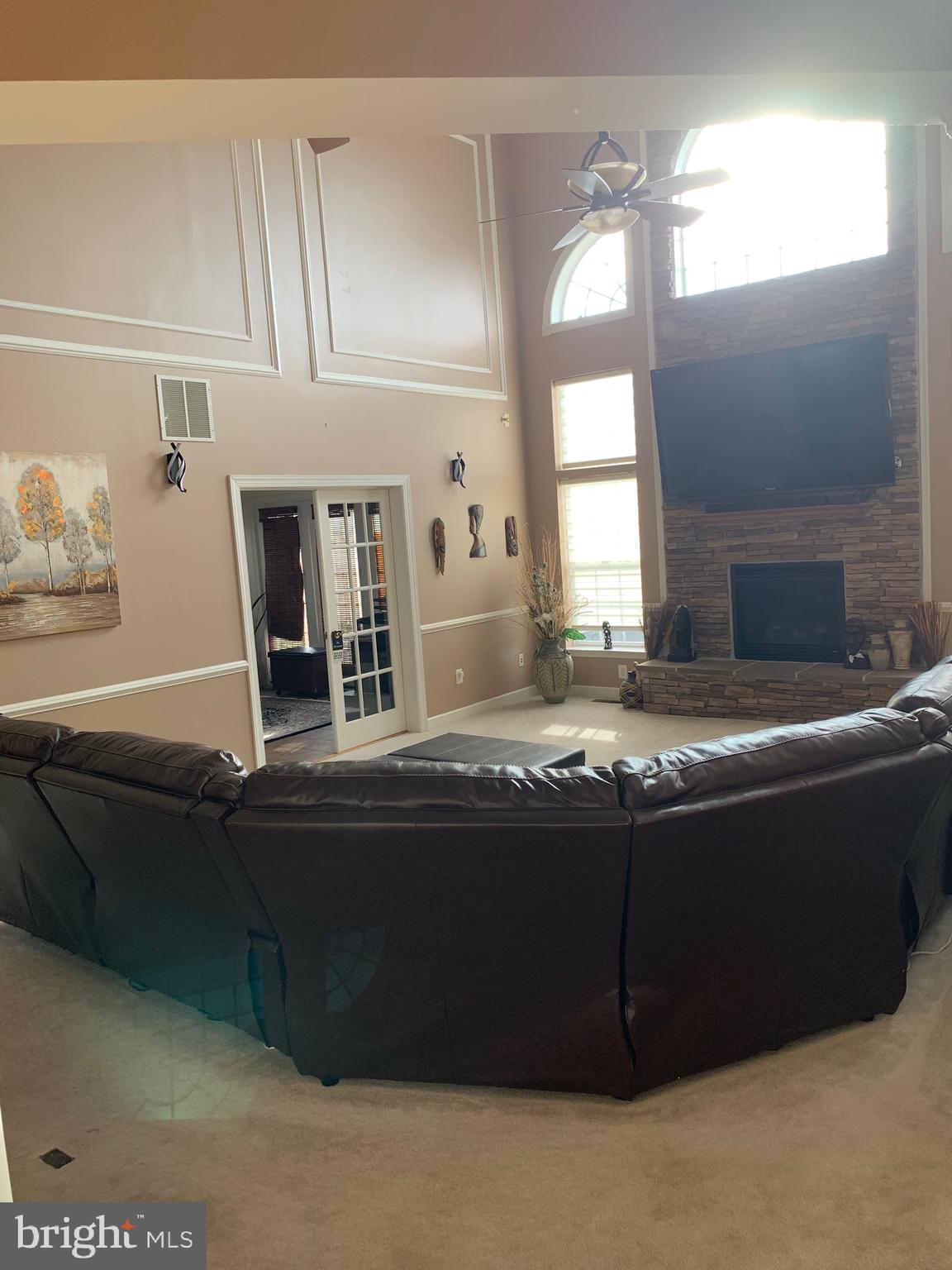 14205 Derby Ridge Road Bowie, MD 20721 - Photo 15 of 53 a living room with granite countertop furniture and fireplace