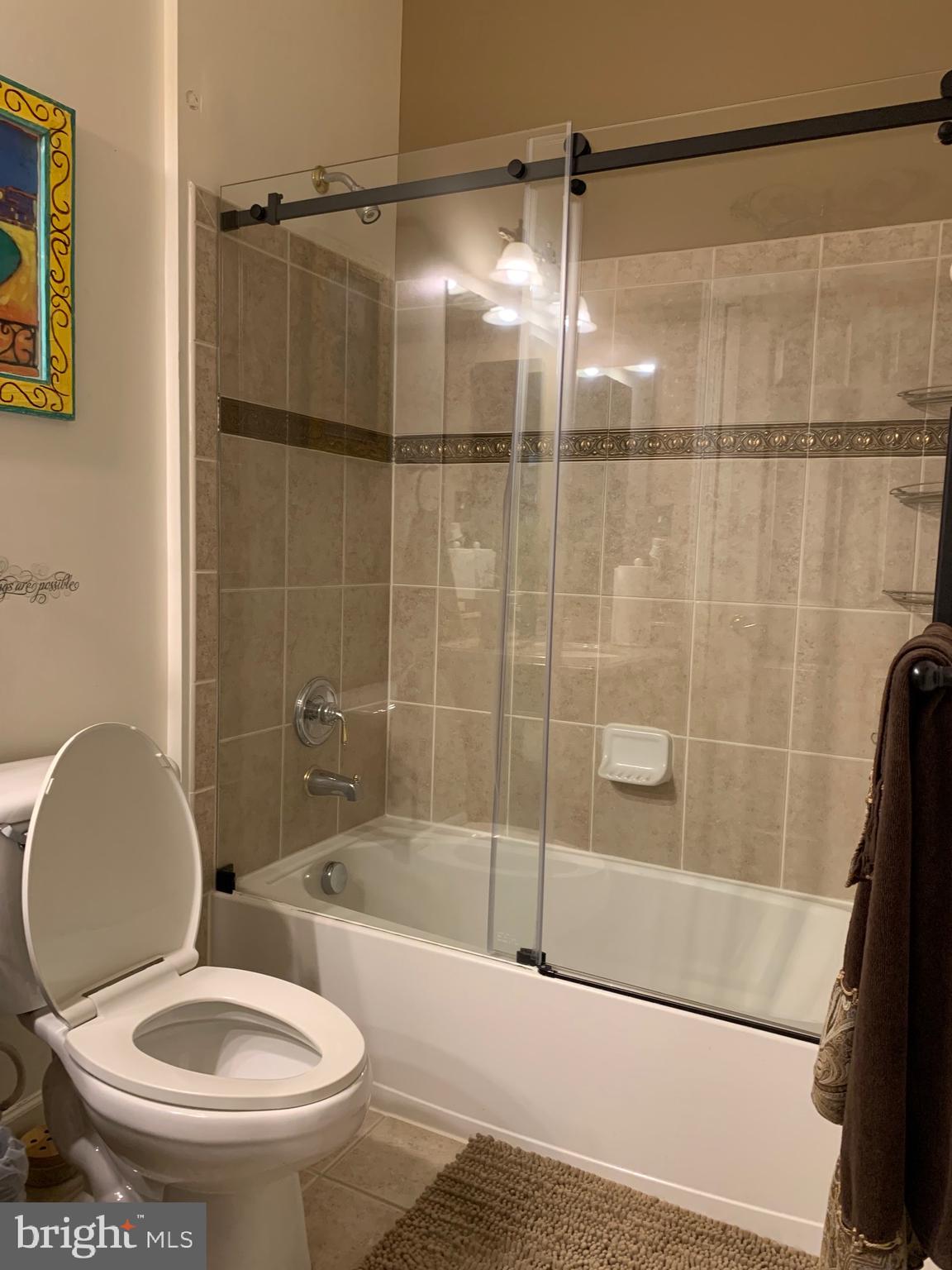 14205 Derby Ridge Road Bowie, MD 20721 - Photo 18 of 53 a bathroom with a toilet and a shower