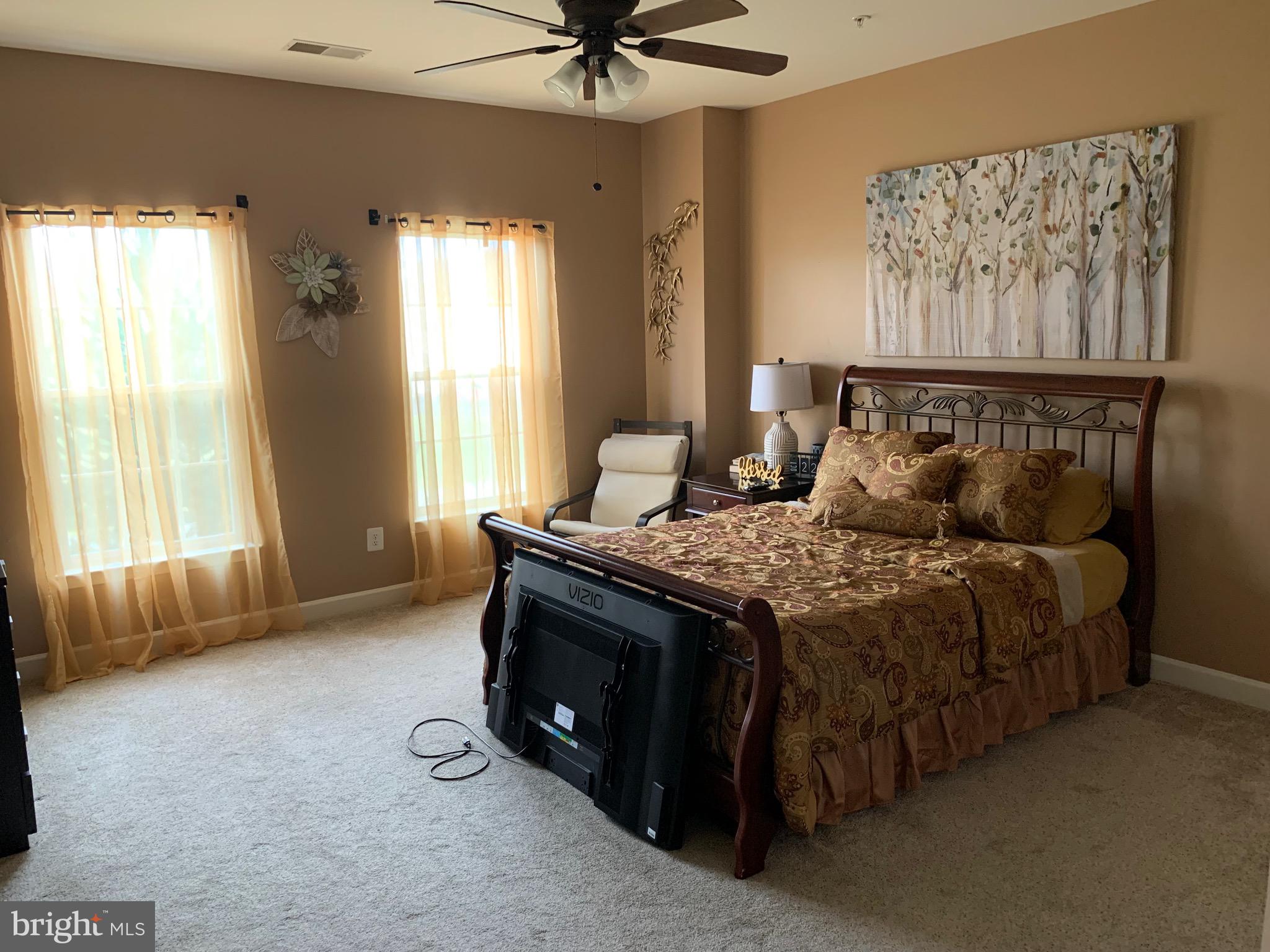 14205 Derby Ridge Road Bowie, MD 20721 - Photo 23 of 53 a bedroom with a bed and a window