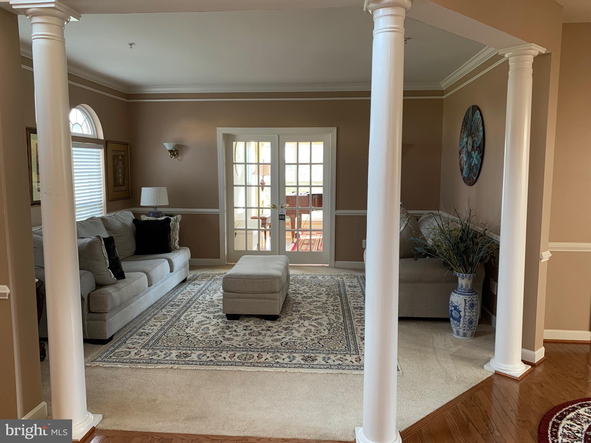 14205 Derby Ridge Road Bowie, MD 20721 - Photo 3 of 53 a living room with furniture and a large window