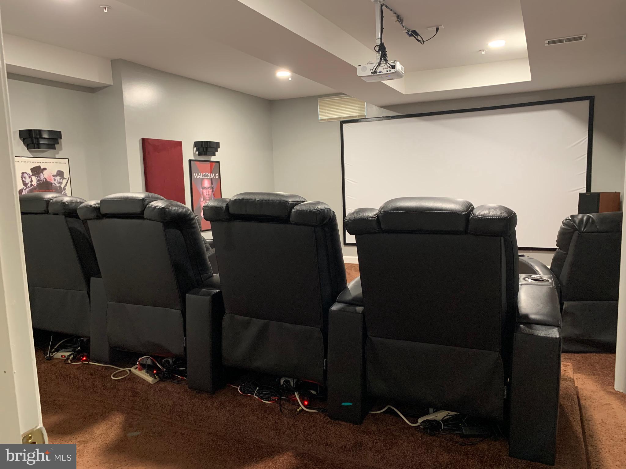 14205 Derby Ridge Road Bowie, MD 20721 - Photo 36 of 53 a projector room with furniture and a projector screen