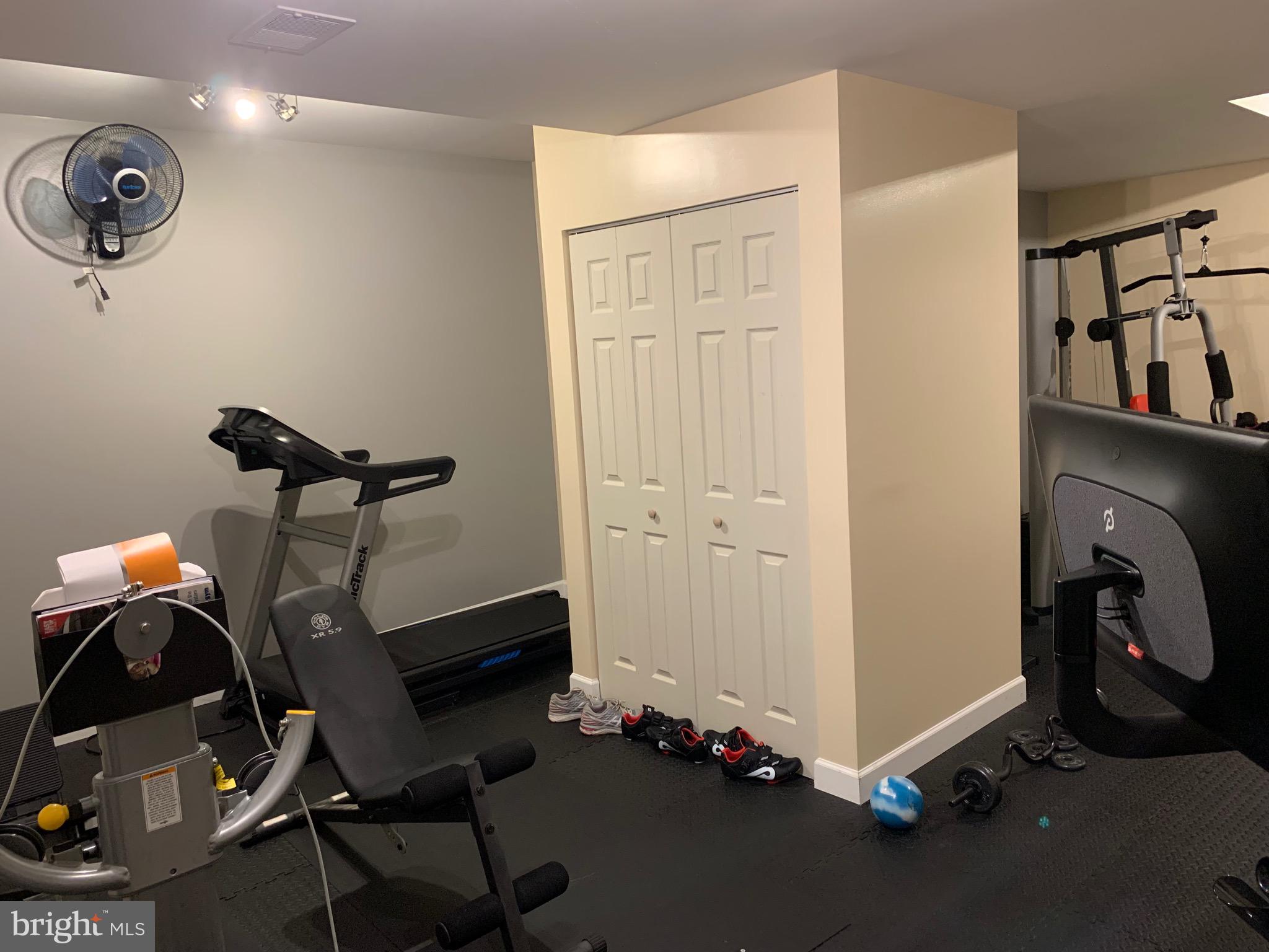 14205 Derby Ridge Road Bowie, MD 20721 - Photo 42 of 53 a room with gym equipment