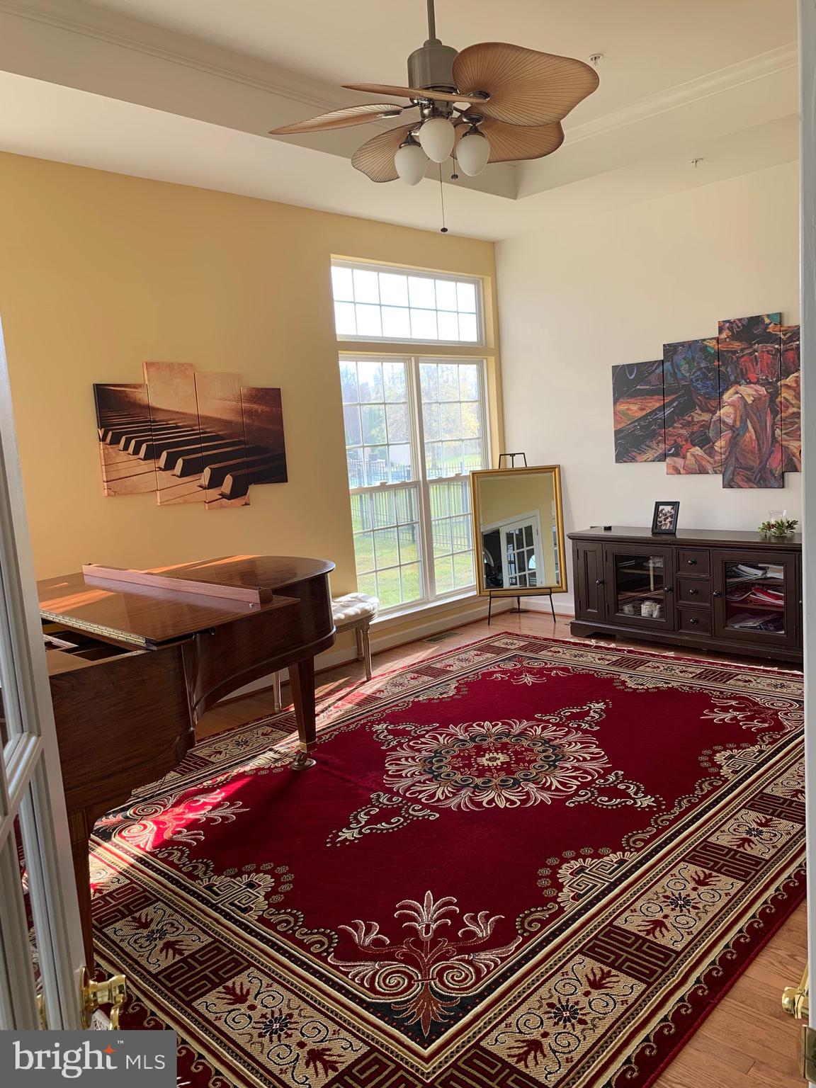 14205 Derby Ridge Road Bowie, MD 20721 - Photo 6 of 53 a picture of a living room with a rug