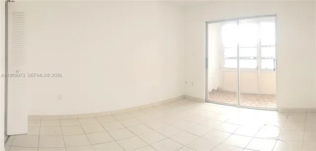 a kitchen with a sink stove and refrigerator