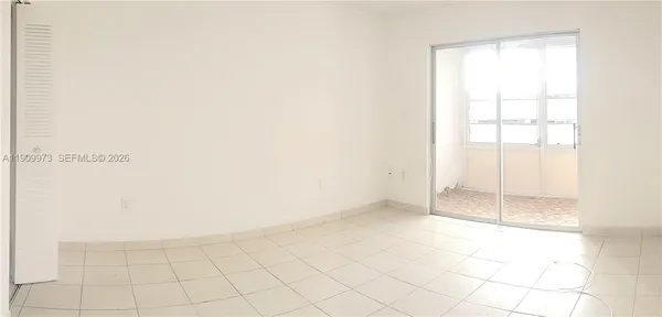 a kitchen with a sink stove and refrigerator
