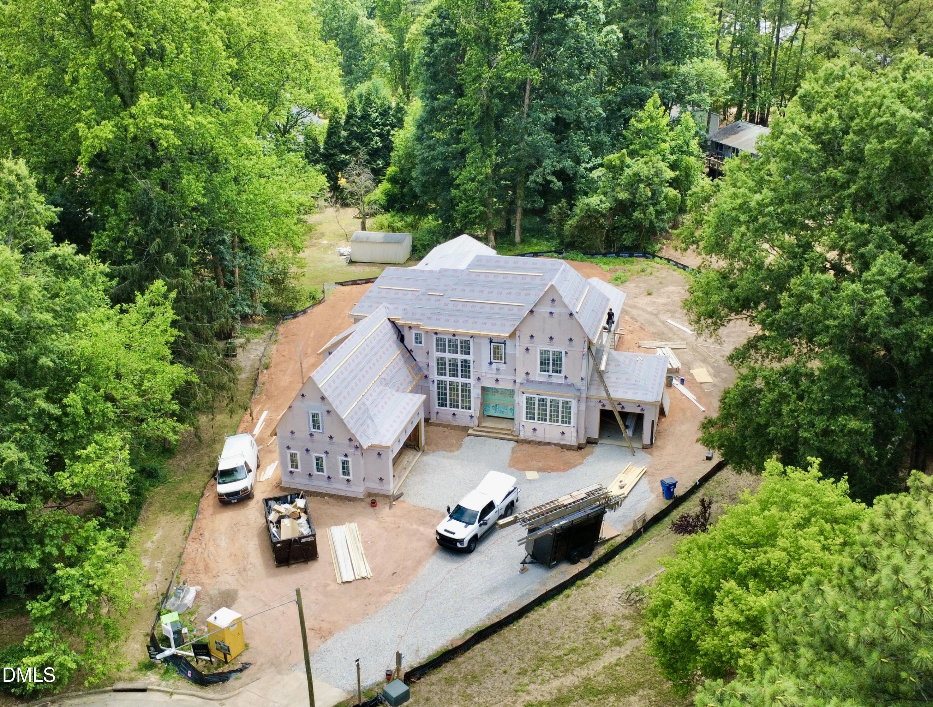 1504 Strothmore Court Raleigh, NC 27615 - Photo 2 of 32 an aerial view of a house with yard swimming pool and outdoor seating