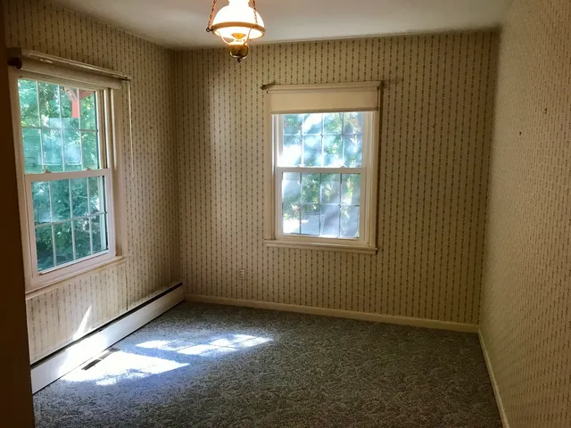 an empty room with a window
