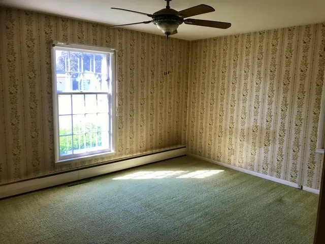 en empty room with windows