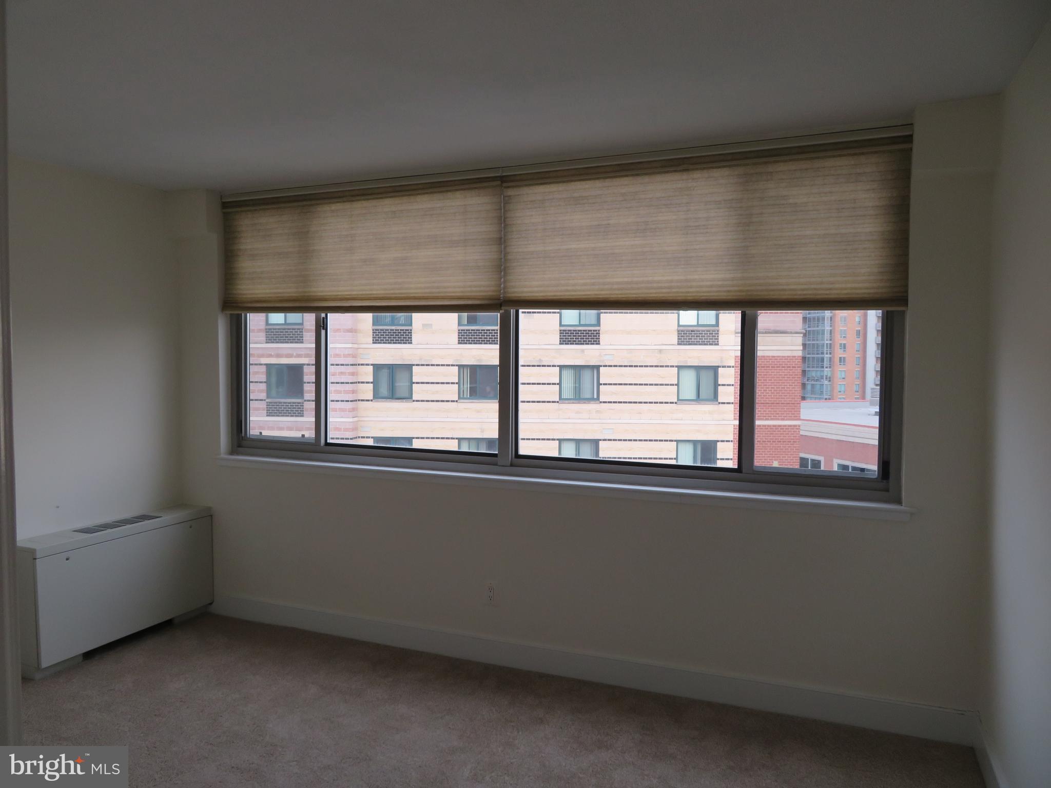 1220 Blair Mill Road, Unit 809 Silver Spring, MD 20910 - Photo 11 of 66 a view of an empty room with a window