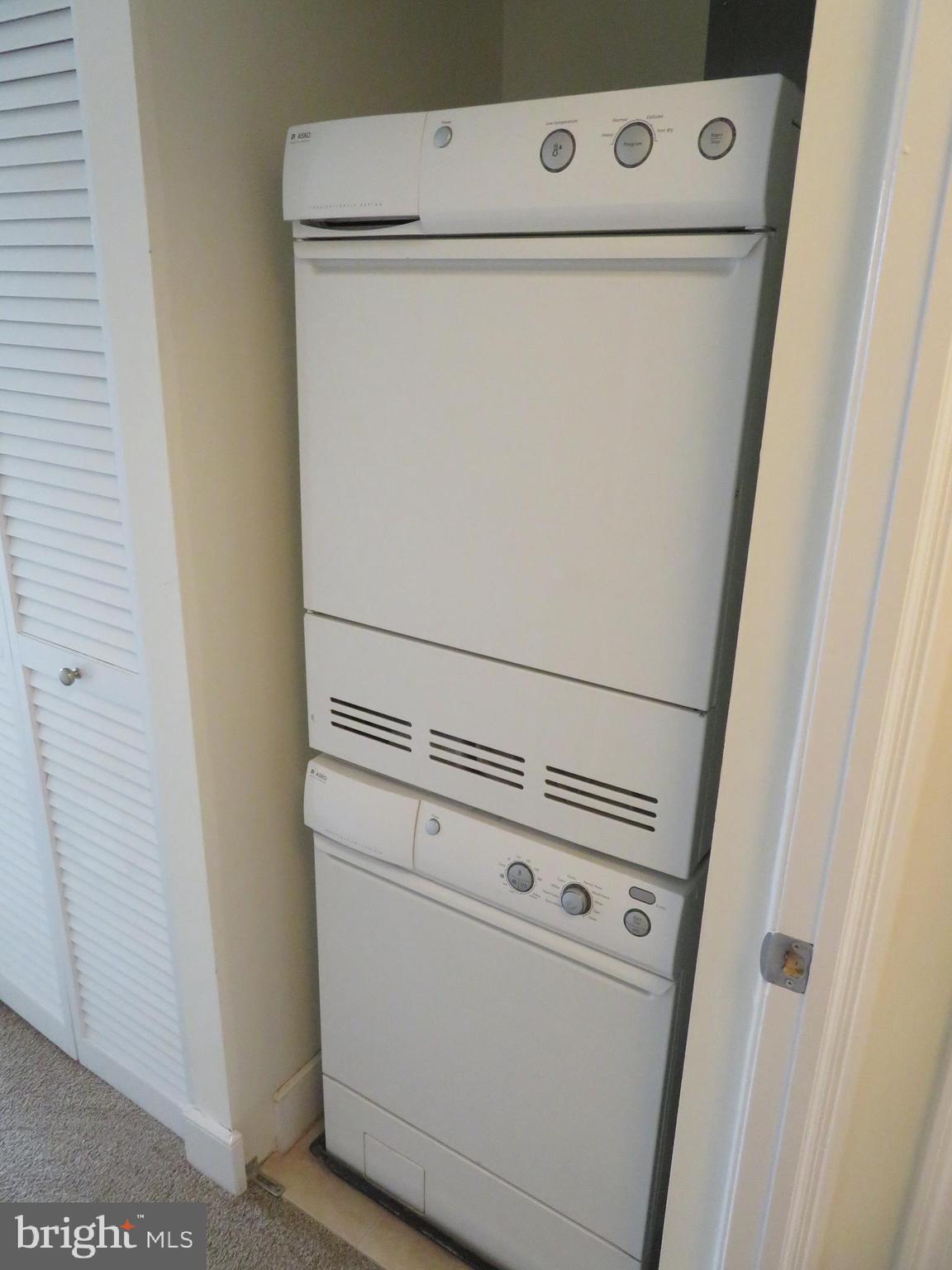 1220 Blair Mill Road, Unit 809 Silver Spring, MD 20910 - Photo 17 of 66 a close up view of washer and dryer