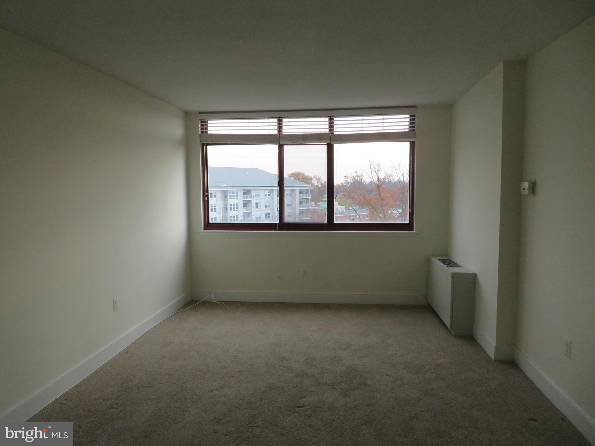 1220 Blair Mill Road, Unit 809 Silver Spring, MD 20910 - Photo 19 of 66 an empty room with a window