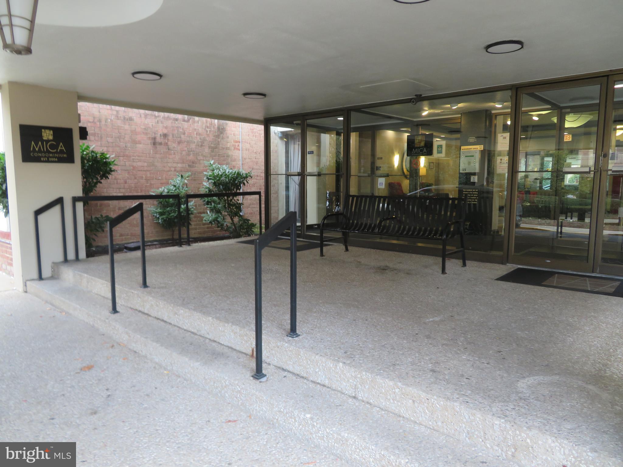 1220 Blair Mill Road, Unit 809 Silver Spring, MD 20910 - Photo 4 of 66 a view of a room with gym equipment and large windows